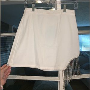 White, denim mini skirt.